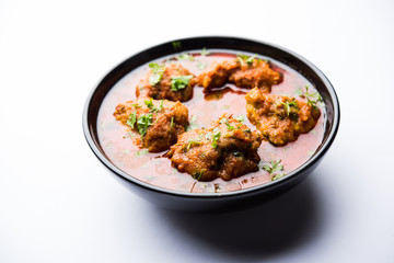 Lauki Kofta Curry made using Bottel Gourd or Doodhi, served in a bowl or karahi. selective focus