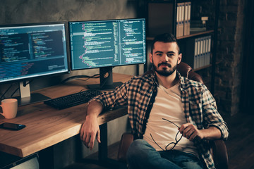 Portrait of his he nice attractive content bearded guy wearing checked shirt expert specialist nerd...