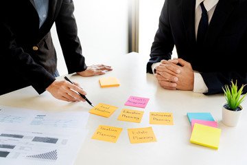 wealth management concept, business man and team analyzing financial statement for planning...
