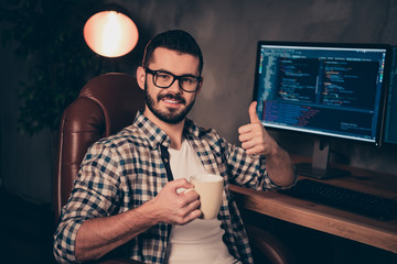 Close up photo stubble handsome he him his guy support programming hands arms mug beverage thumb up...