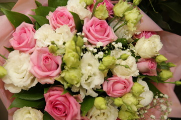 Beautiful bouquet of white and pink roses in blurry focus for background, inscription and postcard. Holidays, birthday, wedding, Valentino day.