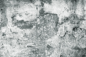 Gray and white concrete wall. Shabby dirty rough surface. Whitewash, old stucco. Cement texture, abstract background.