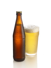 Bottle of beer and a glass on a white background