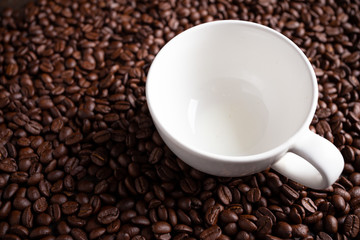 Coffee beans and coffee cup.