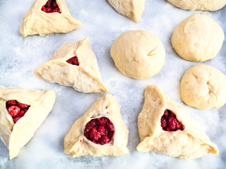 handmade sweet buns filled by fresh raspberries