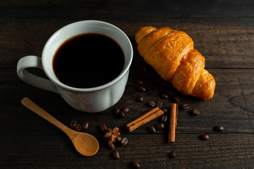 Cup of Coffee on wooden background.