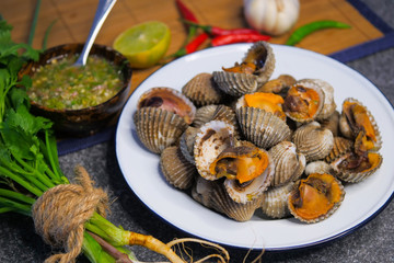 Scallop cockles with Seafood sauce