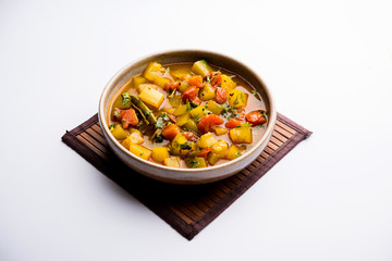 Lauki/doodhi ki Sabji also known as bottle gourd curry. served in a bowl or karahi. selective focus