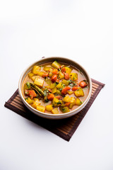 Lauki/doodhi ki Sabji also known as bottle gourd curry. served in a bowl or karahi. selective focus
