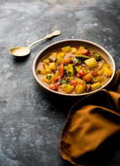Lauki/doodhi ki Sabji also known as bottle gourd curry. served in a bowl or karahi. selective focus