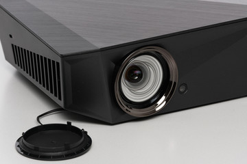 Close up on the lens of a modern mini projektor