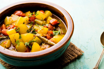 Lauki/doodhi ki Sabji also known as bottle gourd curry. served in a bowl or karahi. selective focus