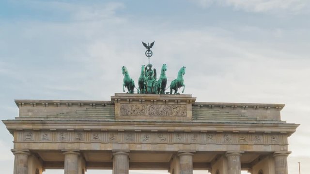 Hyperlapse from day to nigh Close-up of the quadriga chariot at the Brandenburg Gate in Berlin, Germany Time lapse sequence