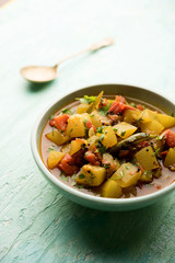 Lauki/doodhi ki Sabji also known as bottle gourd curry. served in a bowl or karahi. selective focus