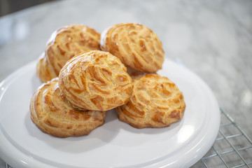 Close-up Choux Cream on a rack.