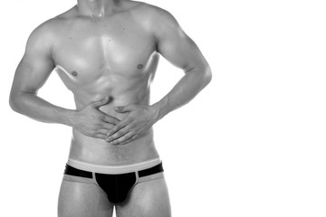 Fototapeta premium Health problem. Stomach ache. White background.