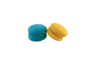 Colorful homemade macaroons on a white background.