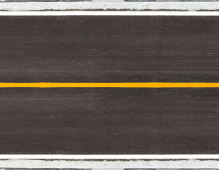 asphalt road with marking lines yellow stripes traffic on the road surface texture Background.