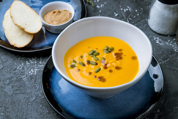 Soup cream of pumpkin on plate