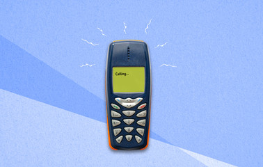 feature phone on paper background
