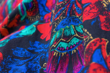 textile fragment of colorful red and blue cloth