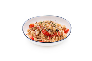 Space fried rice with tomato and mushroom on isolated white background