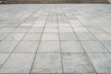Fototapeta premium road paved stones of a Brick Walkway, background and pattern