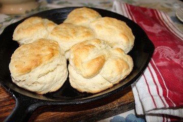 Freshly baked buttermilk biscuits in a cast iron skillet