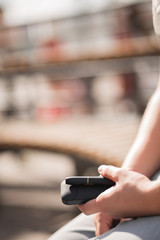  Tobacco product technology. Newest electronic cigarette. Heating tobacco system. Man holding e-cigarette in his hand before smoking. Close-up.