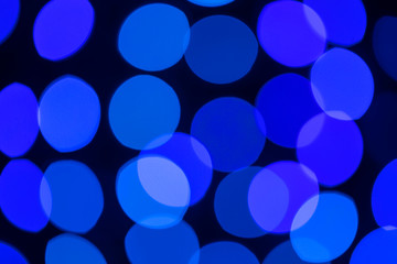 Blurred circles produced by a lens in the out of focus parts of an image.