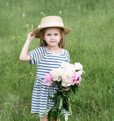 Cute little girl in a field