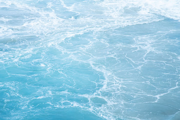 Sea  Waves in ocean wave Splashing Ripple Water. Blue water background.  