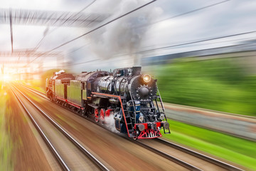 Vintage black steam locomotive train fast rush railway