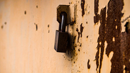 old padlock on the gate