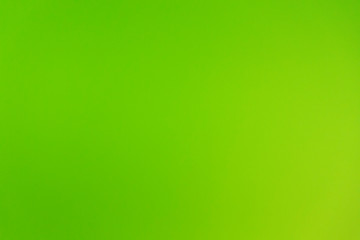 intensive neon green background at a wall