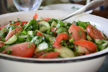 fresh salad with tomatoes and cucumbers