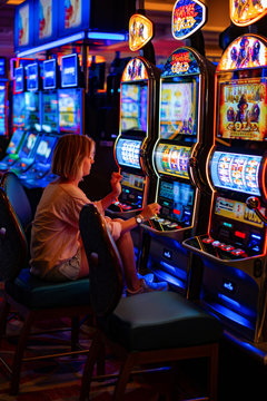 girl in a casino in Las Vegas, .the woman plays for the slot machine