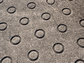 Concrete details on the streets of Osaka in Japan