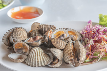 Cockles scalding hot water, Sea food.