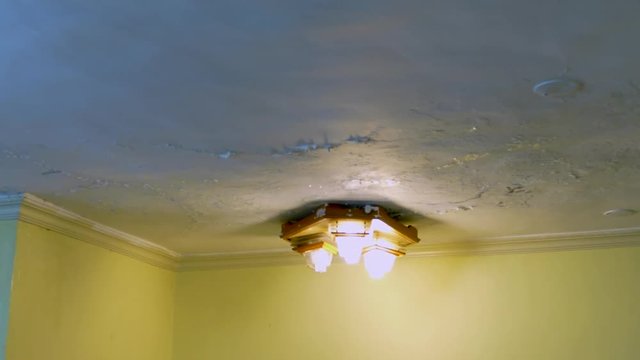 Defocused Leaking ceiling with water damage