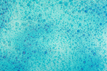 Soap bubbles background- suds liquid