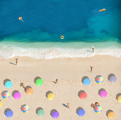 Fototapeta na wymiar Summer beach with people vacation view from above