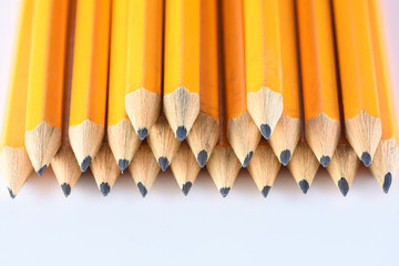 Macro photo of pencils in white table
