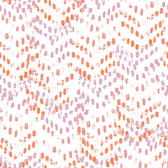 Vector seamless pattern of herringbone. Abstract background with brush strokes. Hand drawn texture with orange and pink color accents.