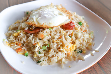 stir-fried rice with deep fried sausage and egg