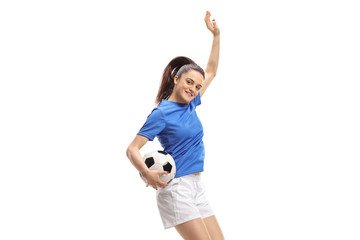 Female soccer player jumping