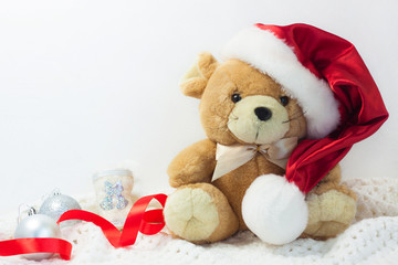 Christmas card with symbol of the year 2020 a rat in a red Santa hat on a white background.