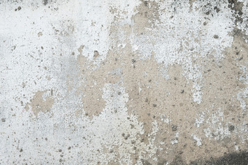 Vintage wall background with peeling paint .