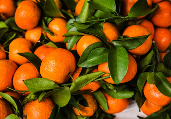 Close-up of oranges for sale at an open market, Vietnam, Southeast Asia