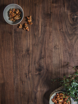 Wooden table with mixed nuts 